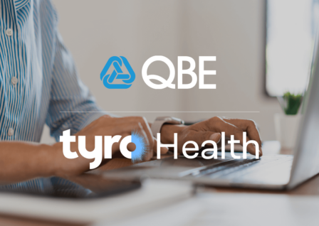 QBE and Tyro logos sitting stacked on a background showing a person typing on a laptop.