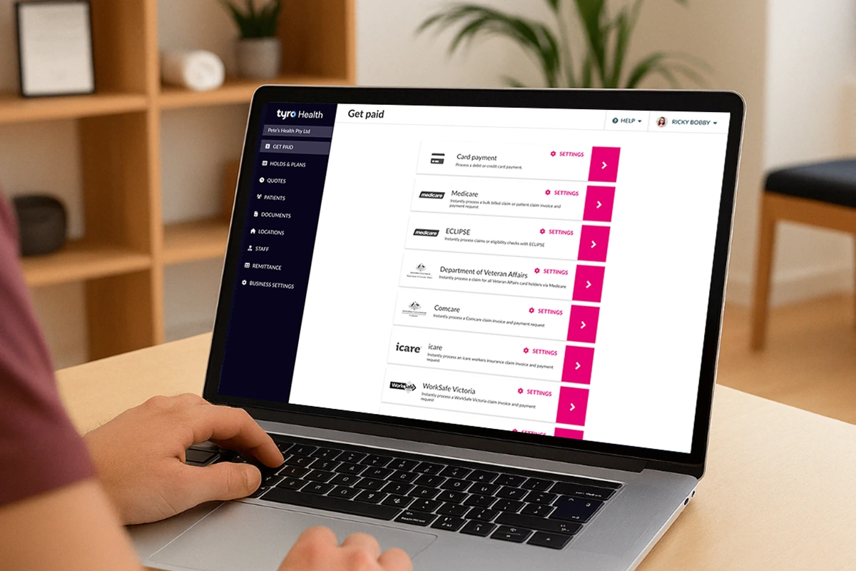 Healthcare user viewing claim processing options on Tyro Health Online through a laptop screen