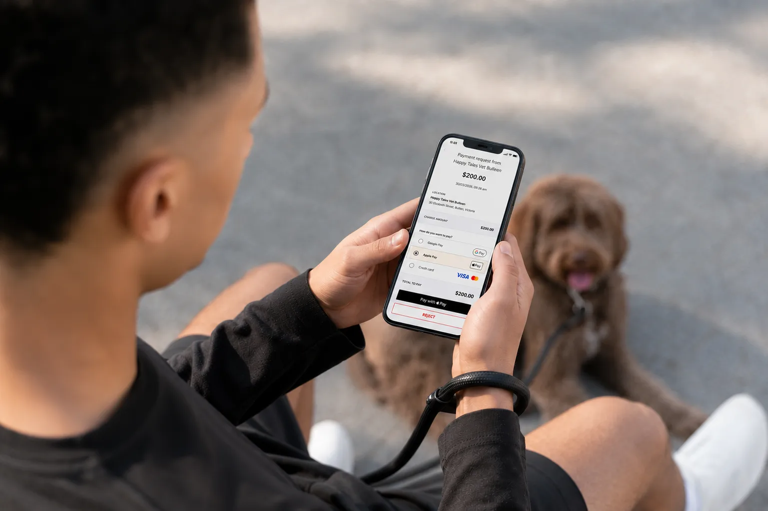Pet owner paying a veterinary invoice online using a secure Tyro Health payment link on a mobile phone after a GapOnly claim sent from the GapOnly Vet Portal